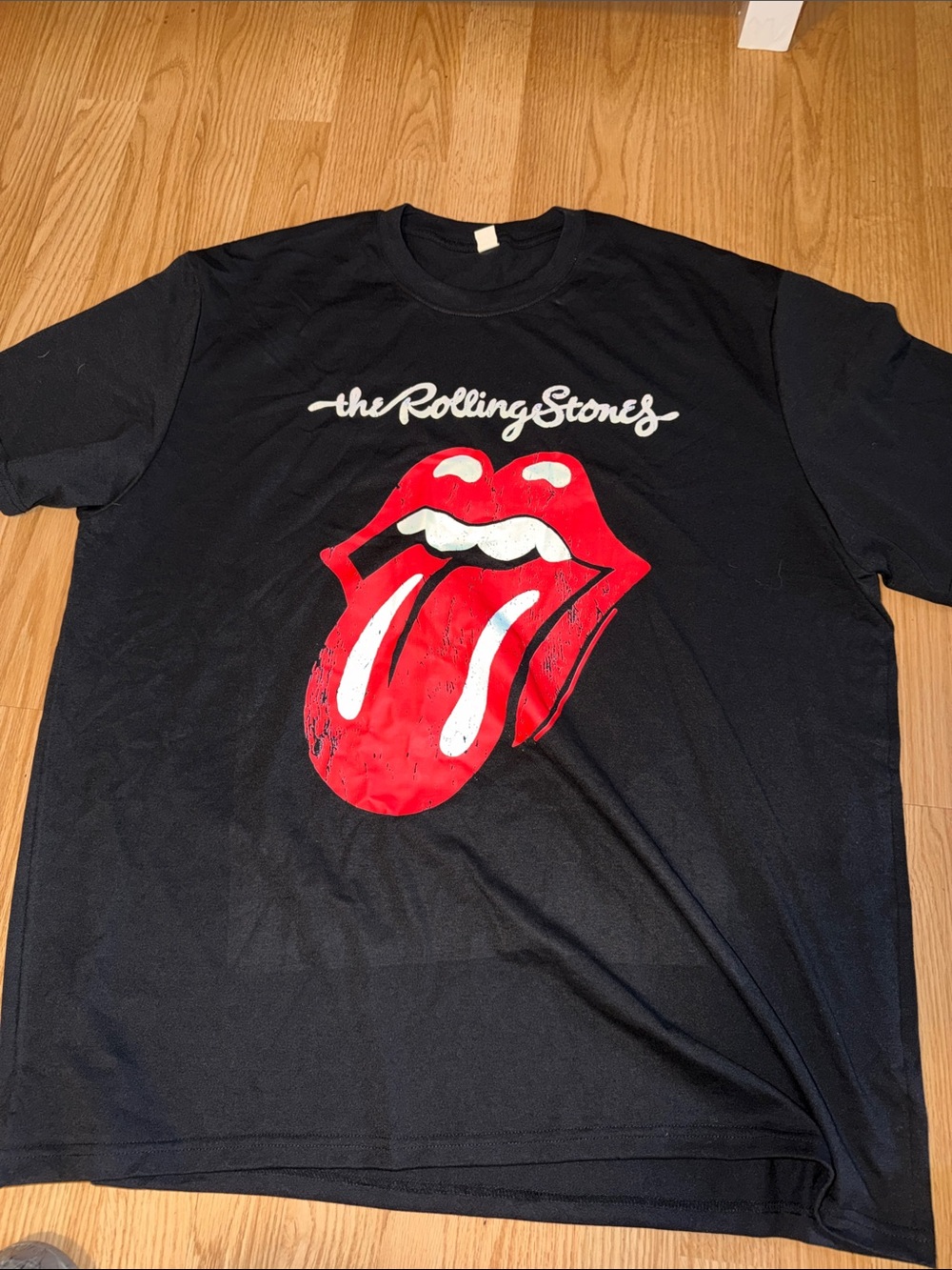 The Rolling Stones Black Tee with Red Tongue Logo and White Script